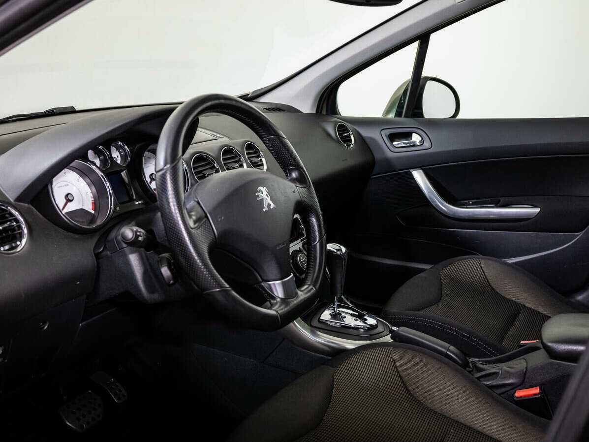 Peugeot 308 2013 года с пробегом. Фото: #10