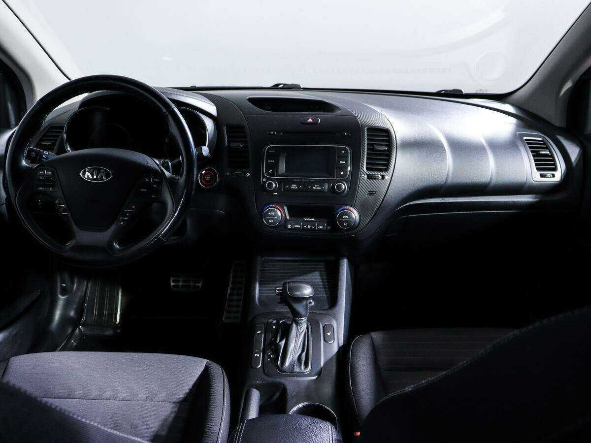 Kia Cerato 2013 года с пробегом. Фото: #11