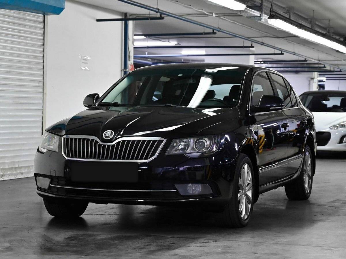 Skoda Superb 2013 года с пробегом. Посмотреть фото