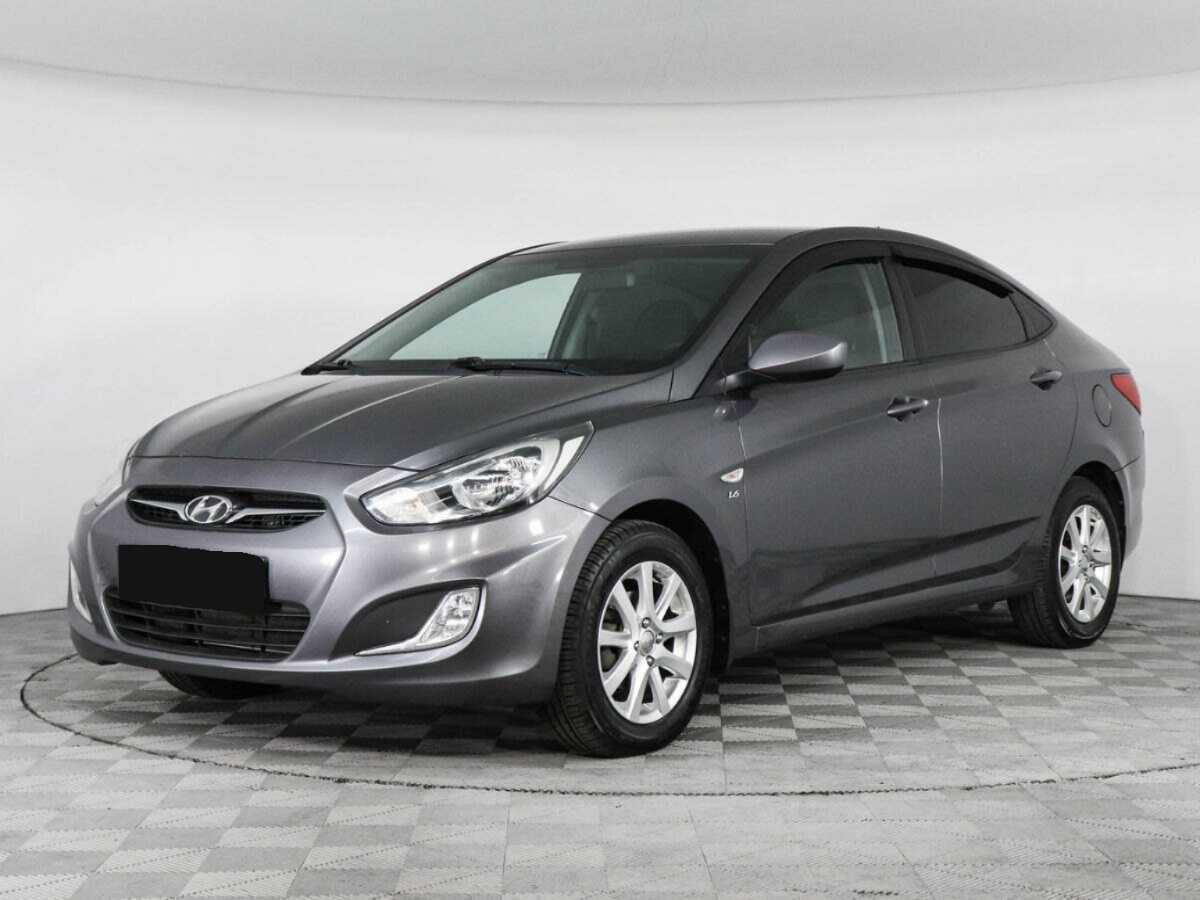 Hyundai Solaris 2013 года с пробегом. Посмотреть фото