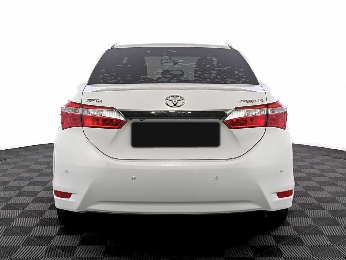 Toyota Corolla 2014 года с пробегом. Фото: #5