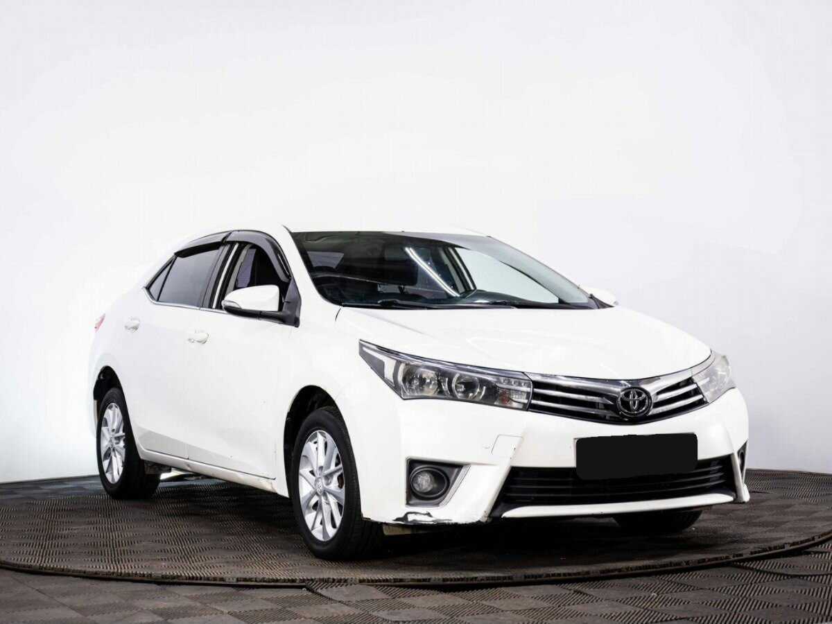 Toyota Corolla 2013 года с пробегом. Фото: #2