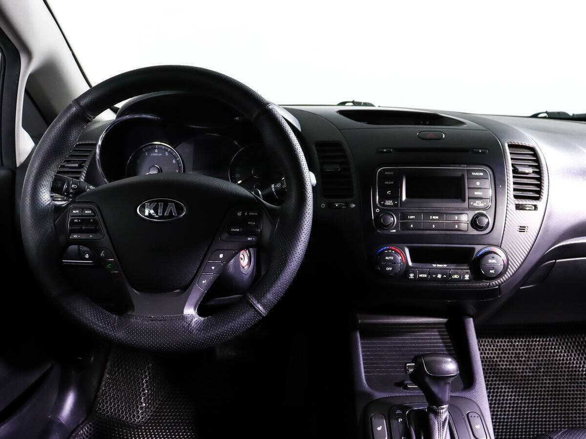 Kia Cerato 2014 года с пробегом. Фото: #11