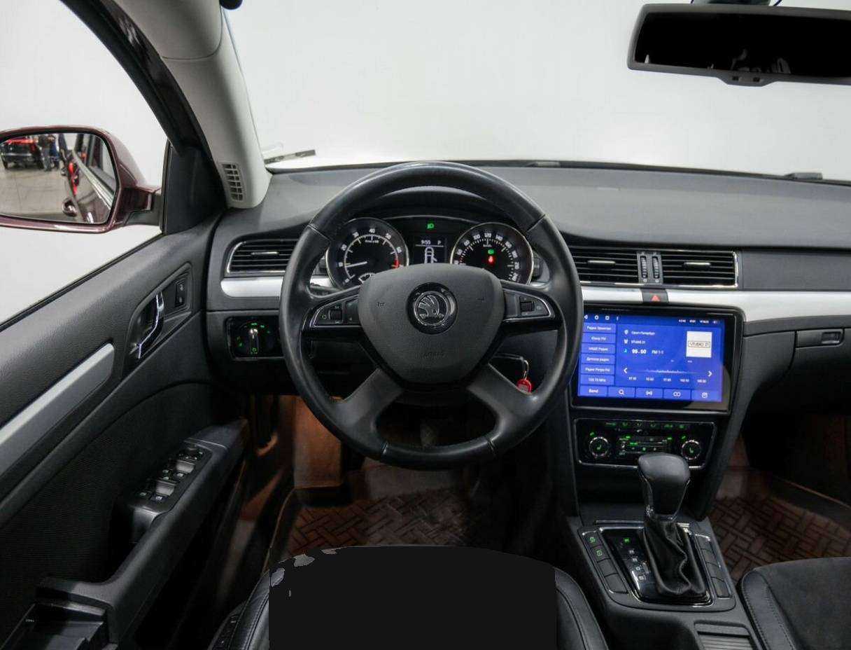 Skoda Superb 2014 года с пробегом. Фото: #11