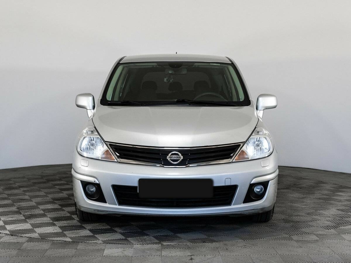 Nissan Tiida 2013 года с пробегом. Фото: #1