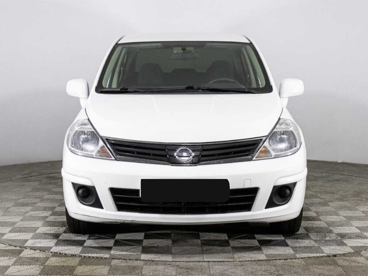 Nissan Tiida 2013 года с пробегом. Фото: #1