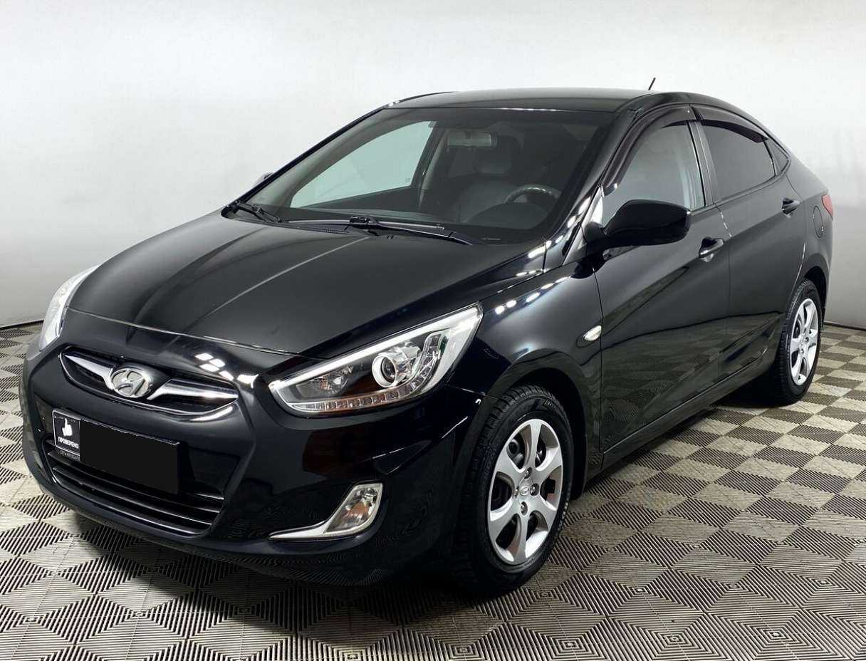 Hyundai Solaris 2013 года с пробегом. Посмотреть фото