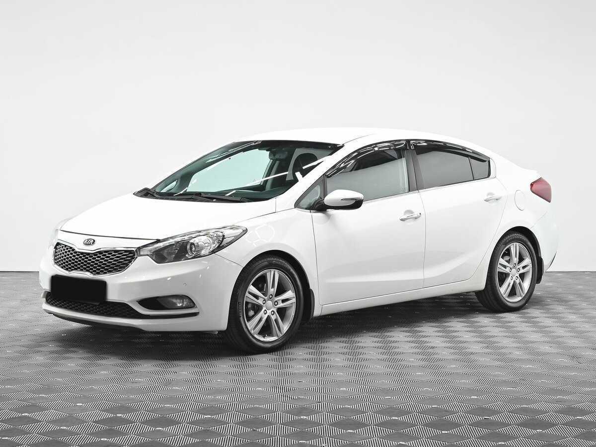 Kia Cerato 2013 года с пробегом. Посмотреть фото