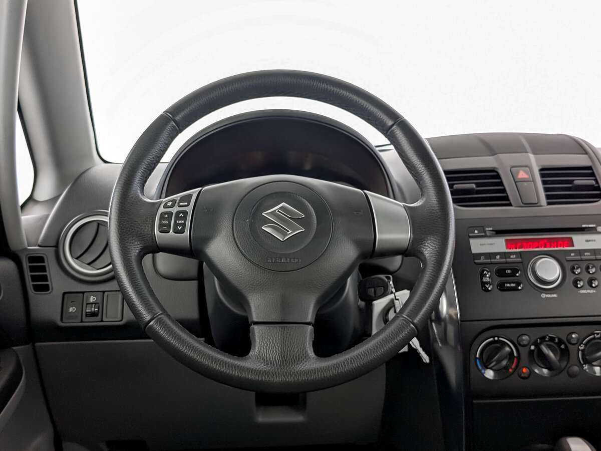 Suzuki SX4 2013 года с пробегом. Фото: #16