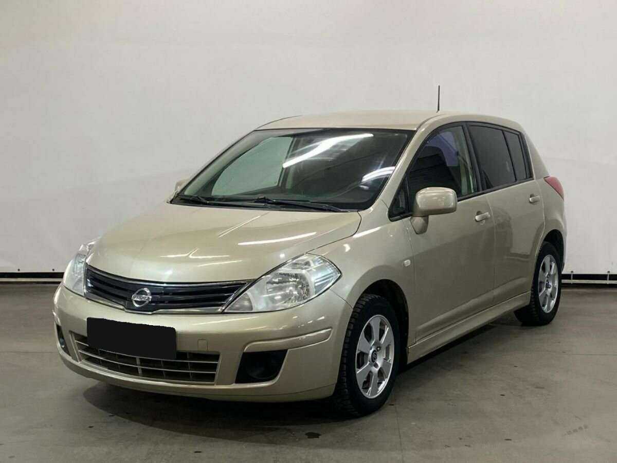 Nissan Tiida 2013 года с пробегом. Посмотреть фото
