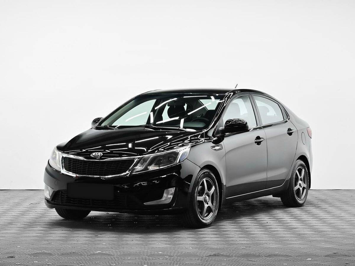 Kia Rio 2014 года с пробегом. Посмотреть фото