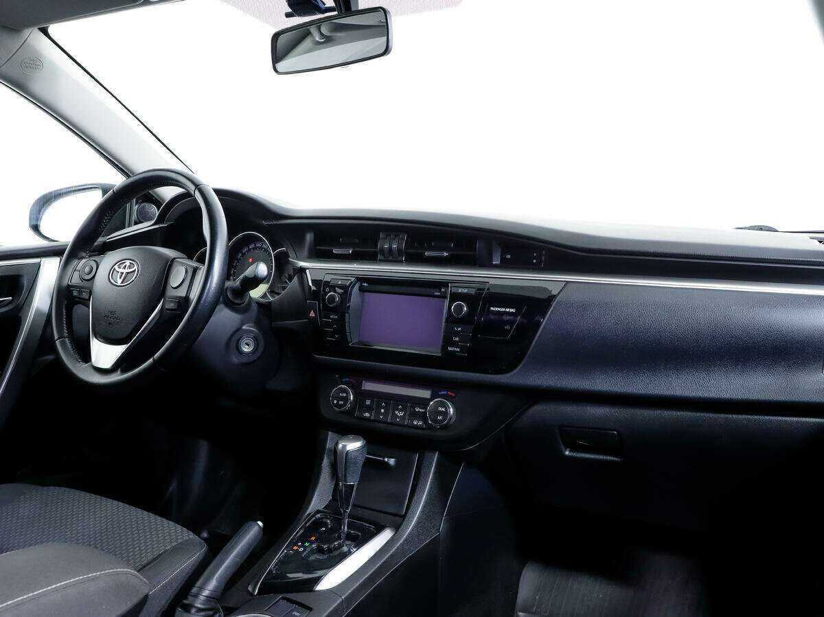 Toyota Corolla 2014 года с пробегом. Фото: #8