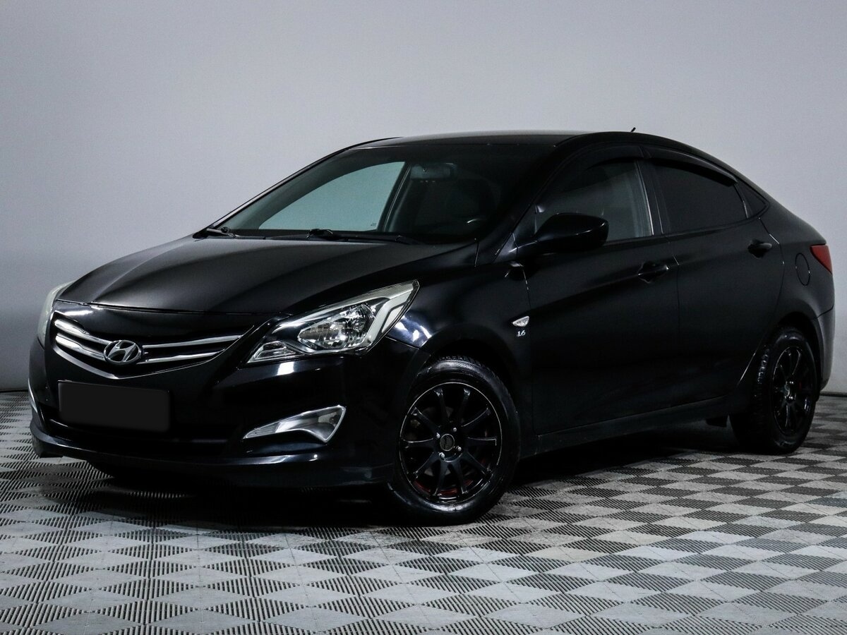 Hyundai Solaris 2015 года с пробегом. Посмотреть фото