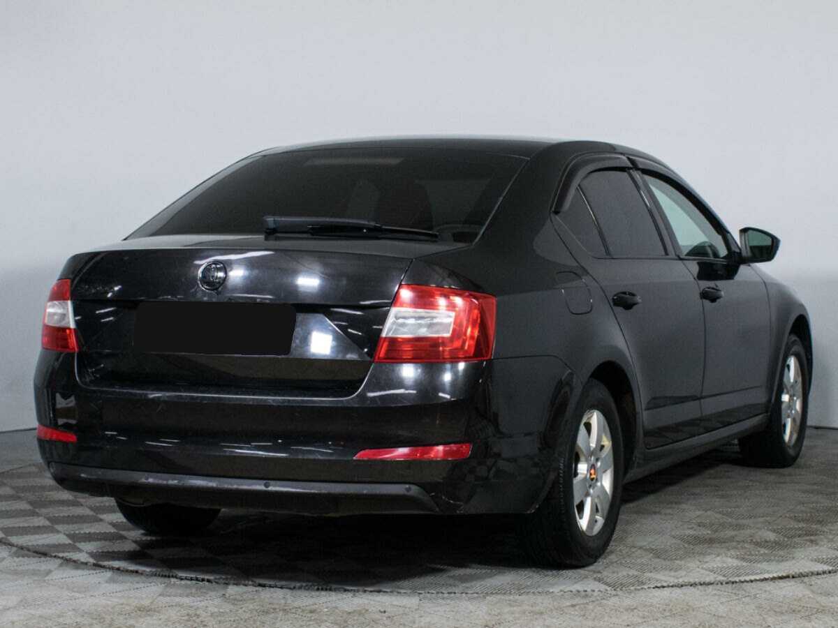 Skoda Octavia 2013 года с пробегом. Фото: #4