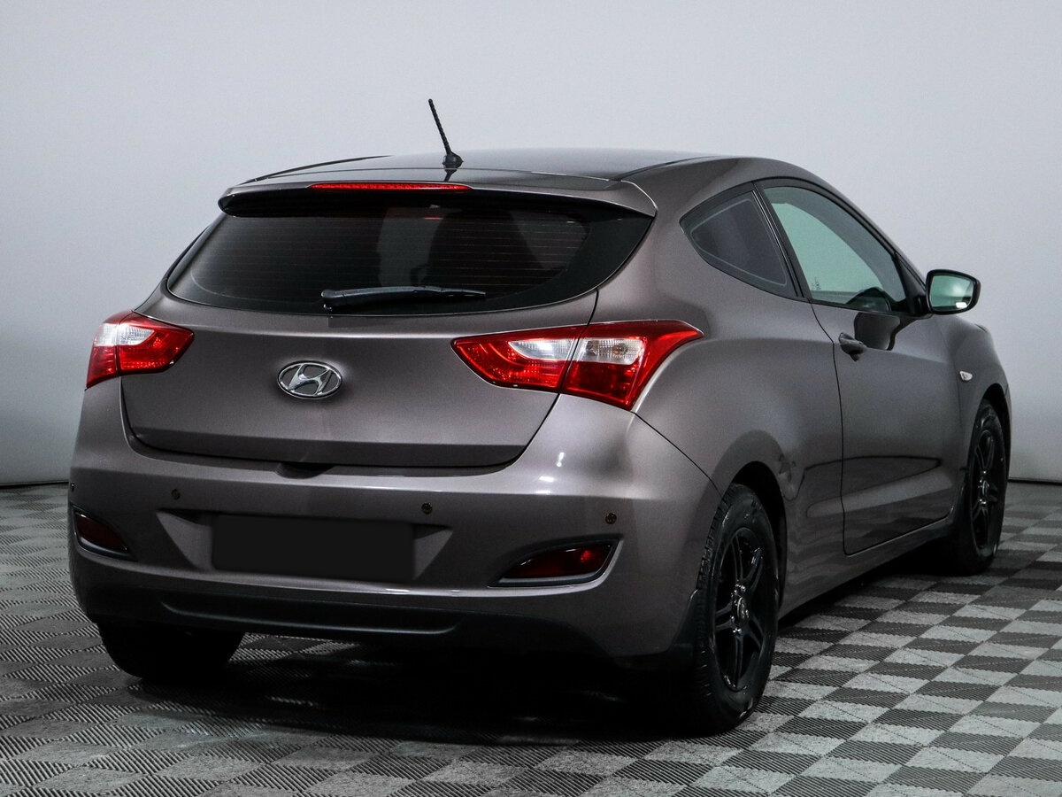 Hyundai i30 2014 года с пробегом. Фото: #3