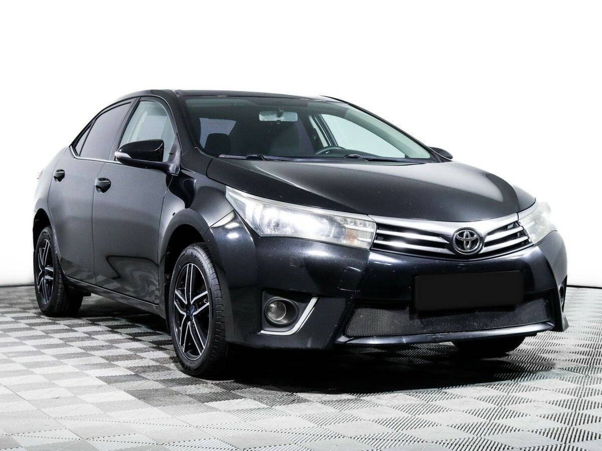 Toyota Corolla 2014 года с пробегом. Фото: #2
