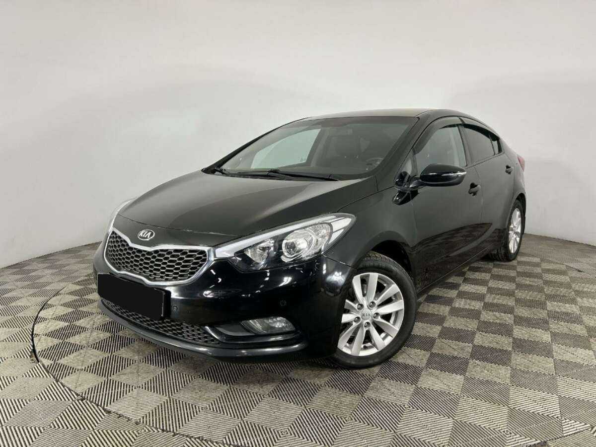 Kia Cerato 2014 года с пробегом. Посмотреть фото
