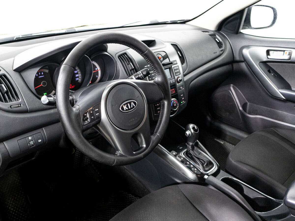Kia Cerato 2012 года с пробегом. Фото: #10