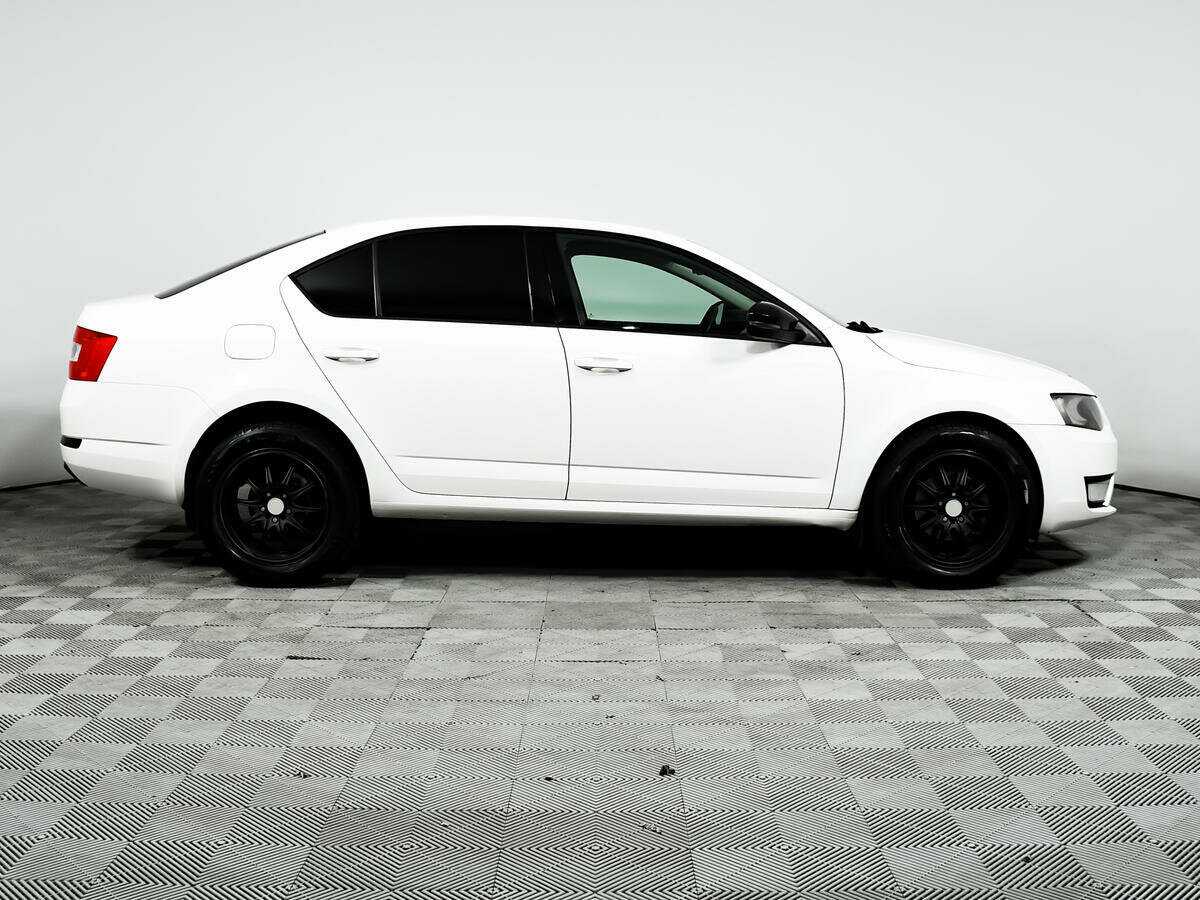Skoda Octavia 2014 года с пробегом. Фото: #3