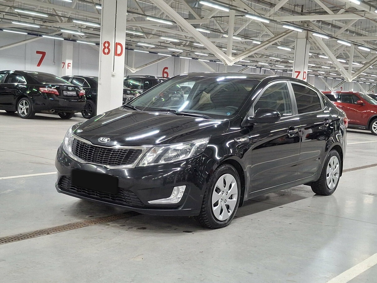 Kia Rio 2014 года с пробегом. Посмотреть фото