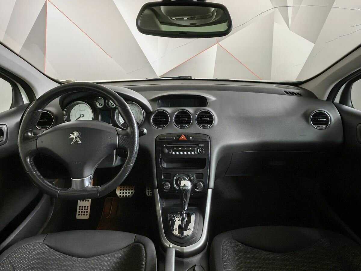 Peugeot 308 2012 года с пробегом. Фото: #8