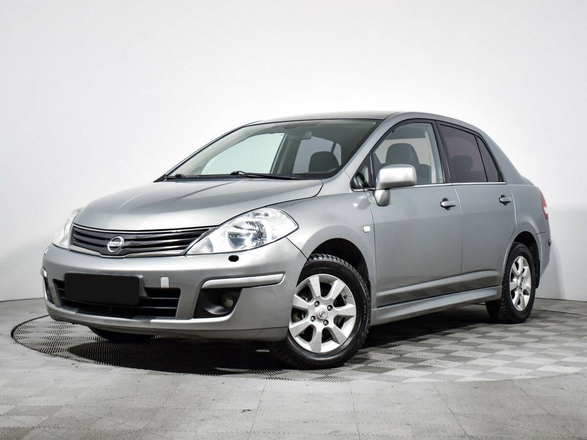 Nissan Tiida 2013 года с пробегом. Посмотреть фото