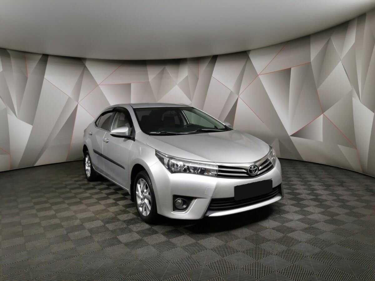 Toyota Corolla 2013 года с пробегом. Фото: #2