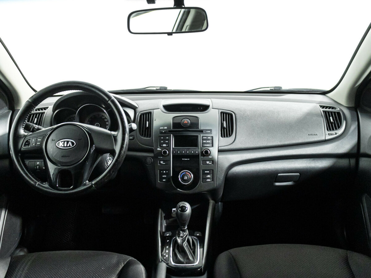 Kia Cerato 2012 года с пробегом. Фото: #12