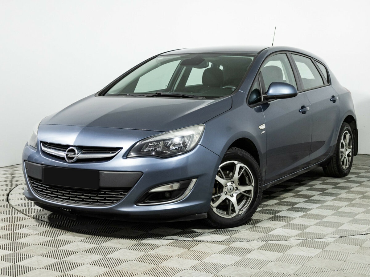 Opel Astra 2013 года с пробегом. Посмотреть фото