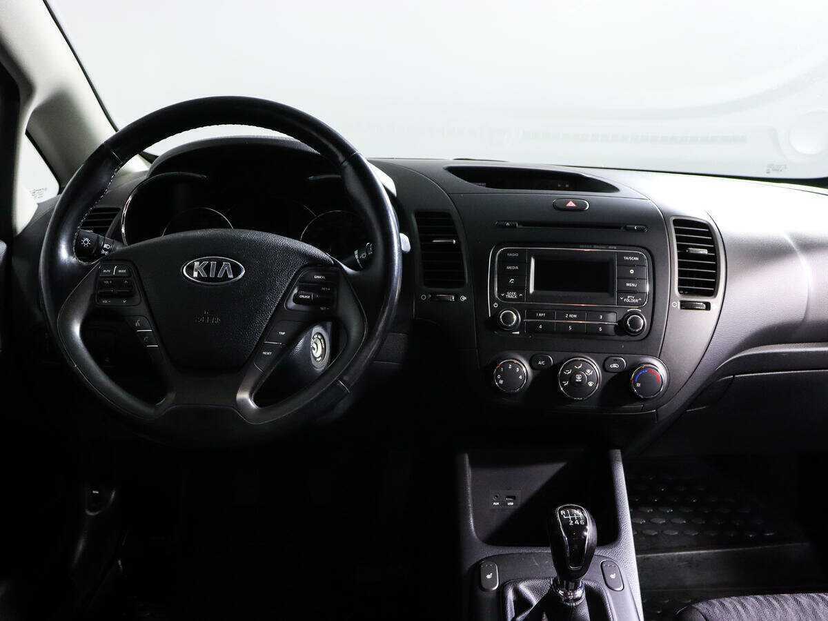 Kia Cerato 2014 года с пробегом. Фото: #11
