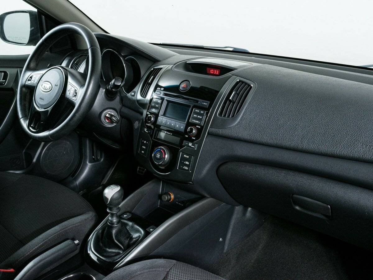 Kia Cerato 2012 года с пробегом. Фото: #9