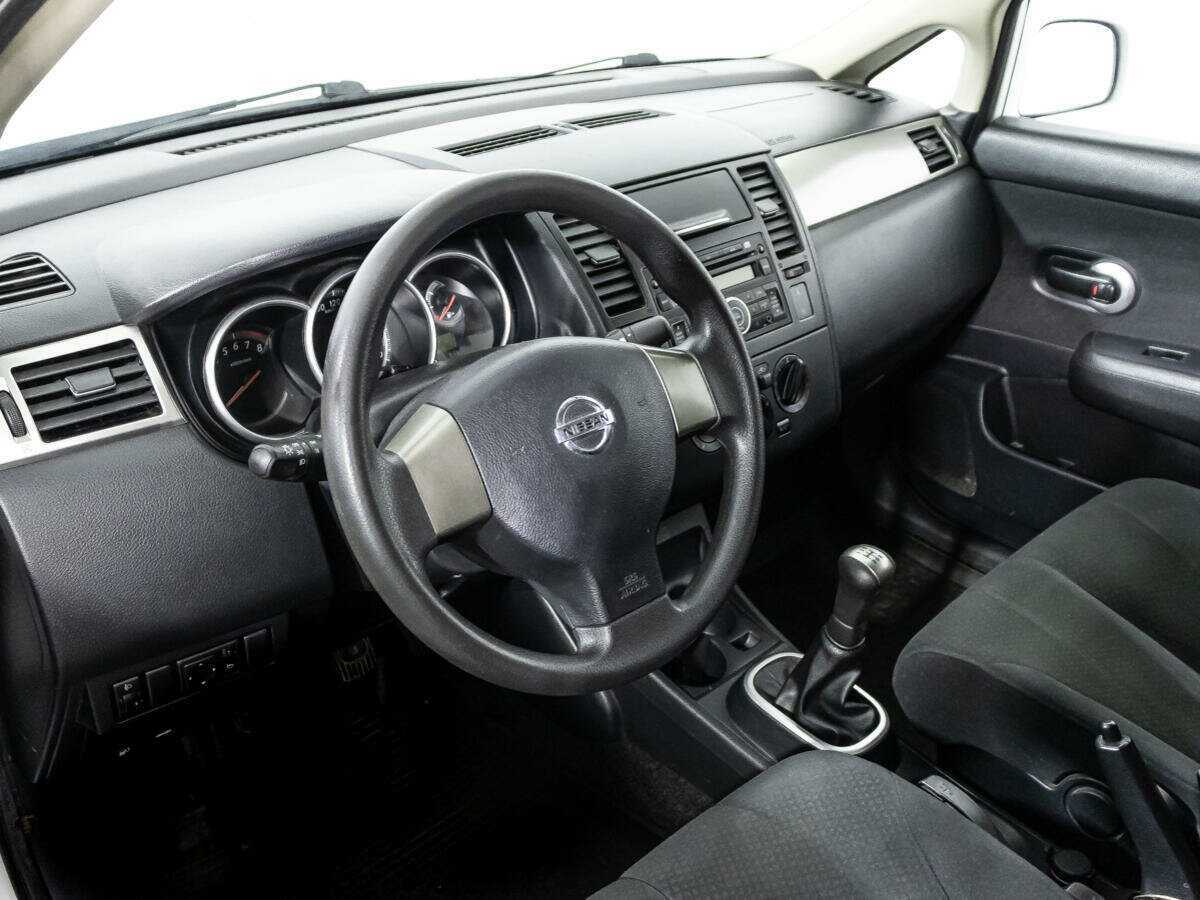 Nissan Tiida 2013 года с пробегом. Фото: #10