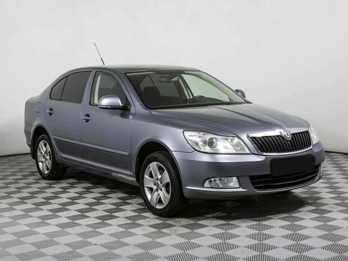 Skoda Octavia 2013 года с пробегом. Фото: #2