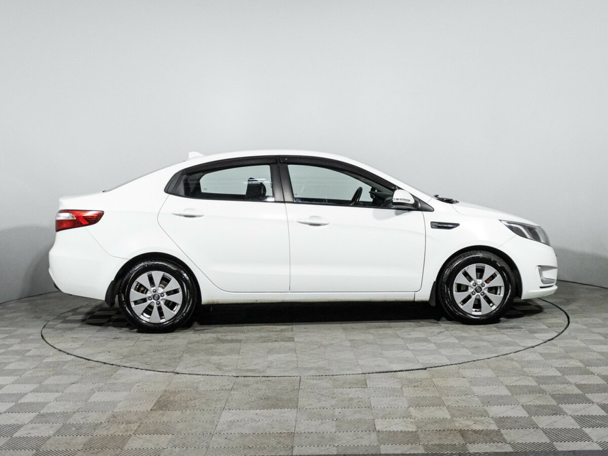 Kia Rio 2013 года с пробегом. Фото: #3