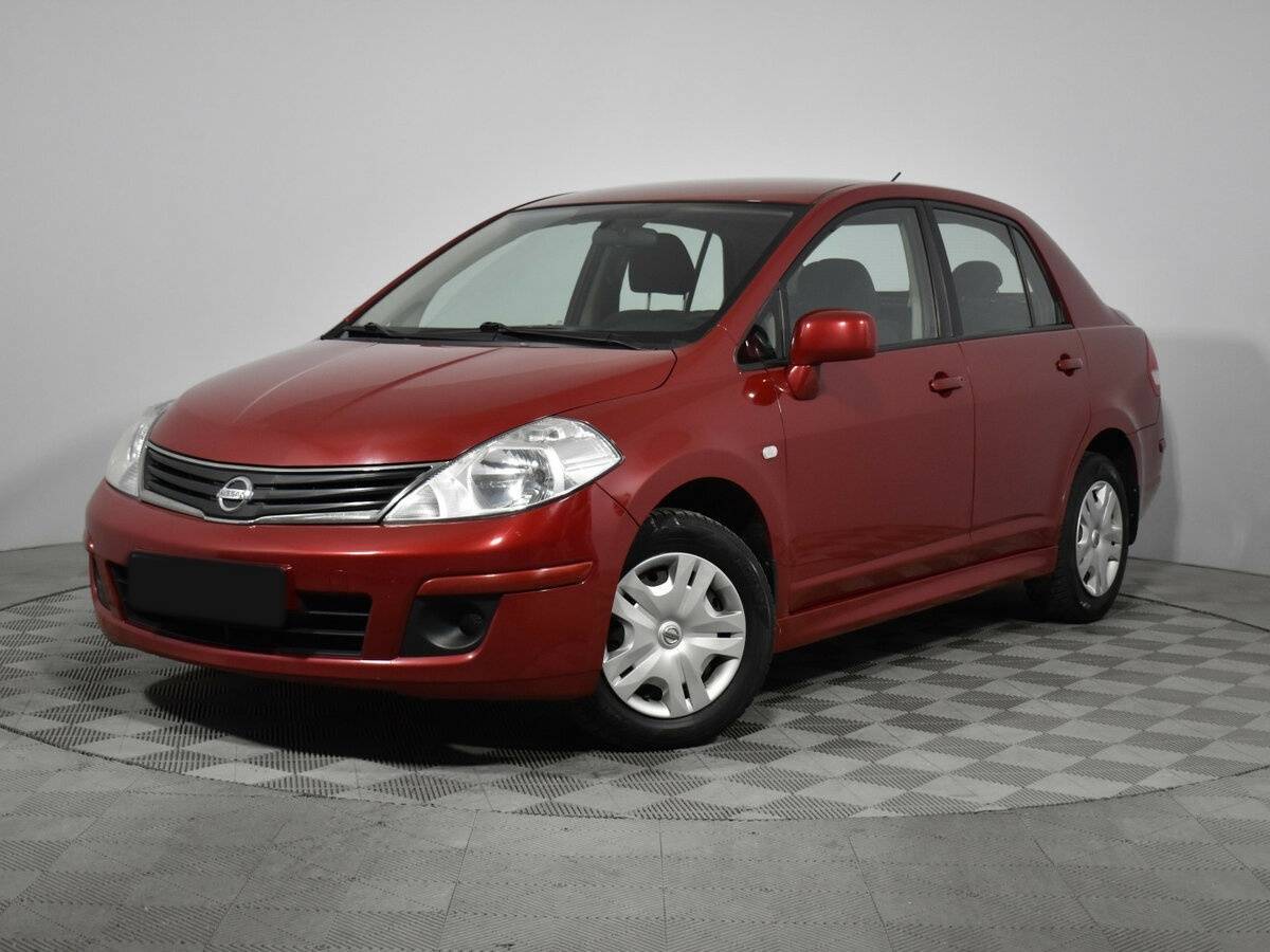 Nissan Tiida 2012 года с пробегом. Фото: #0