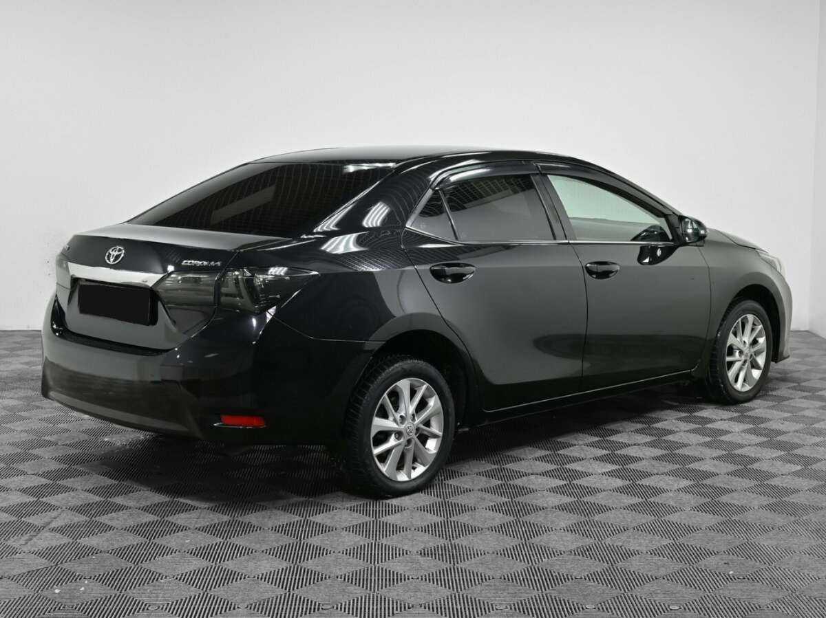 Б/У Тойота Королла 2015 года. Фото: #1