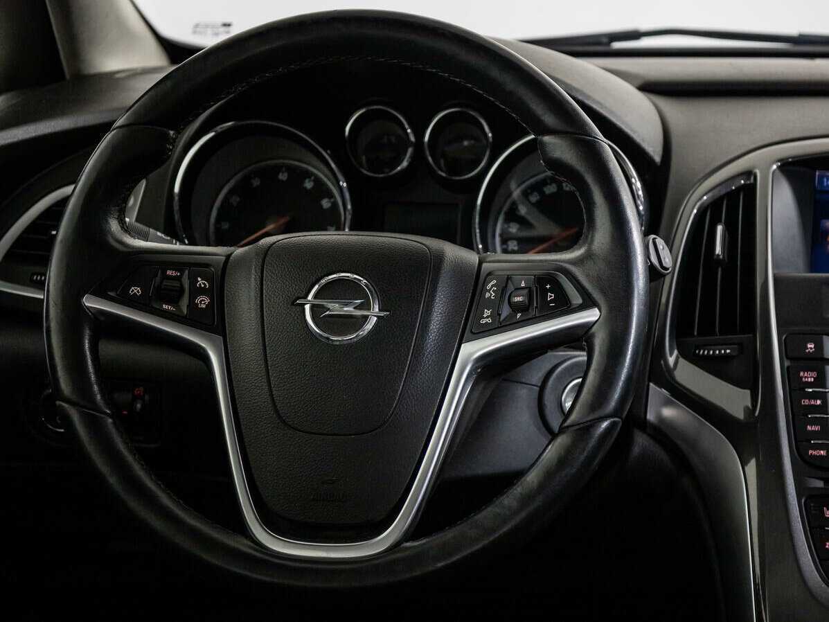 Б/У Опель Астра 2012 года. Фото: #11