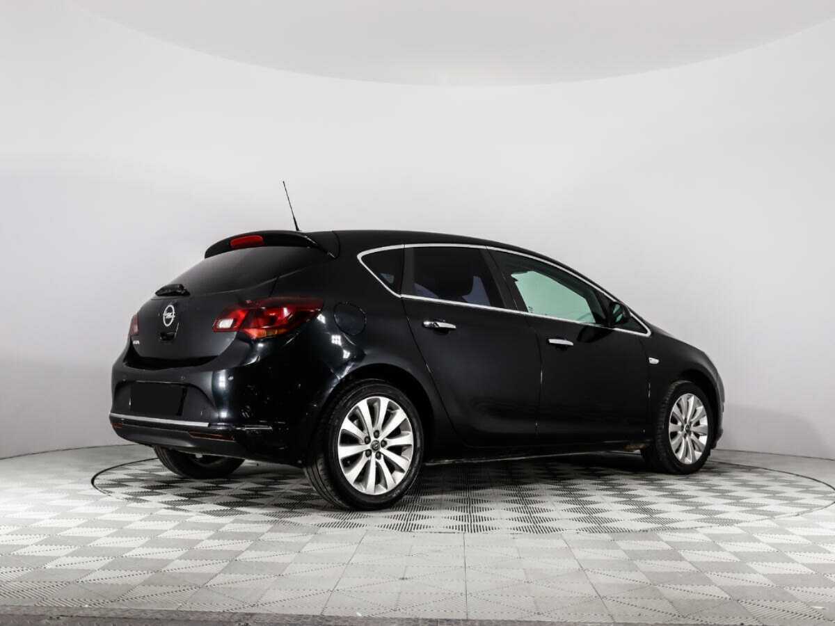 Б/У Опель Астра 2013 года. Фото: #4