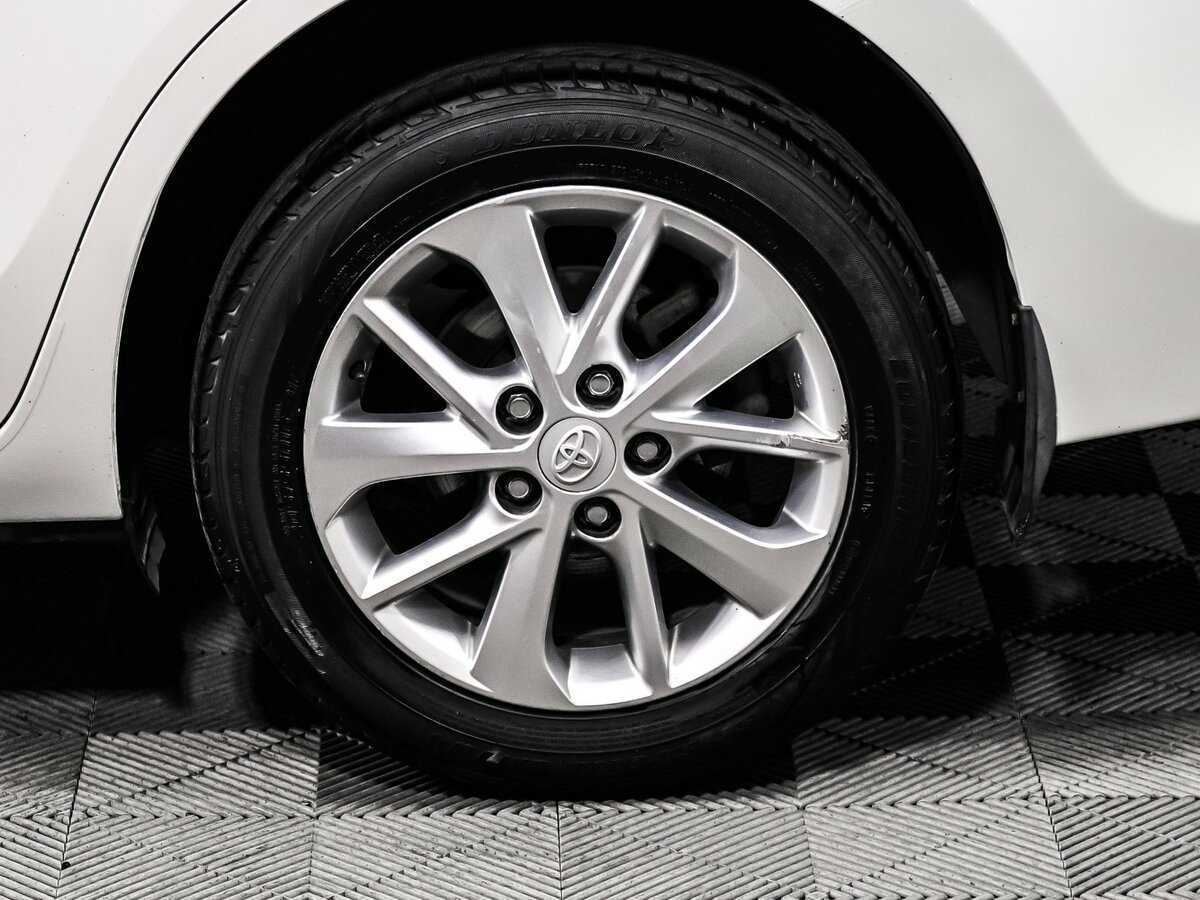 Б/У Тойота Королла 2013 года. Фото: #12