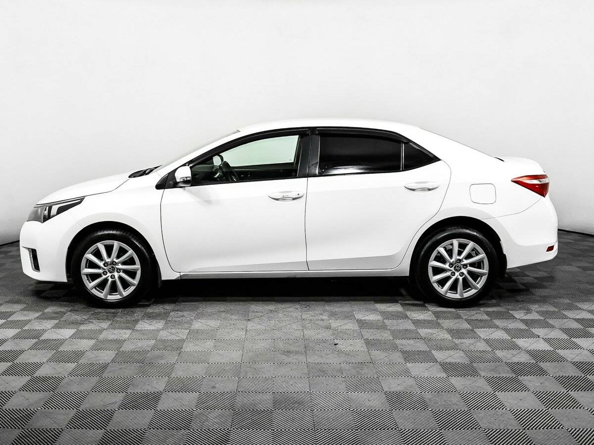 Б/У Тойота Королла 2013 года. Фото: #7