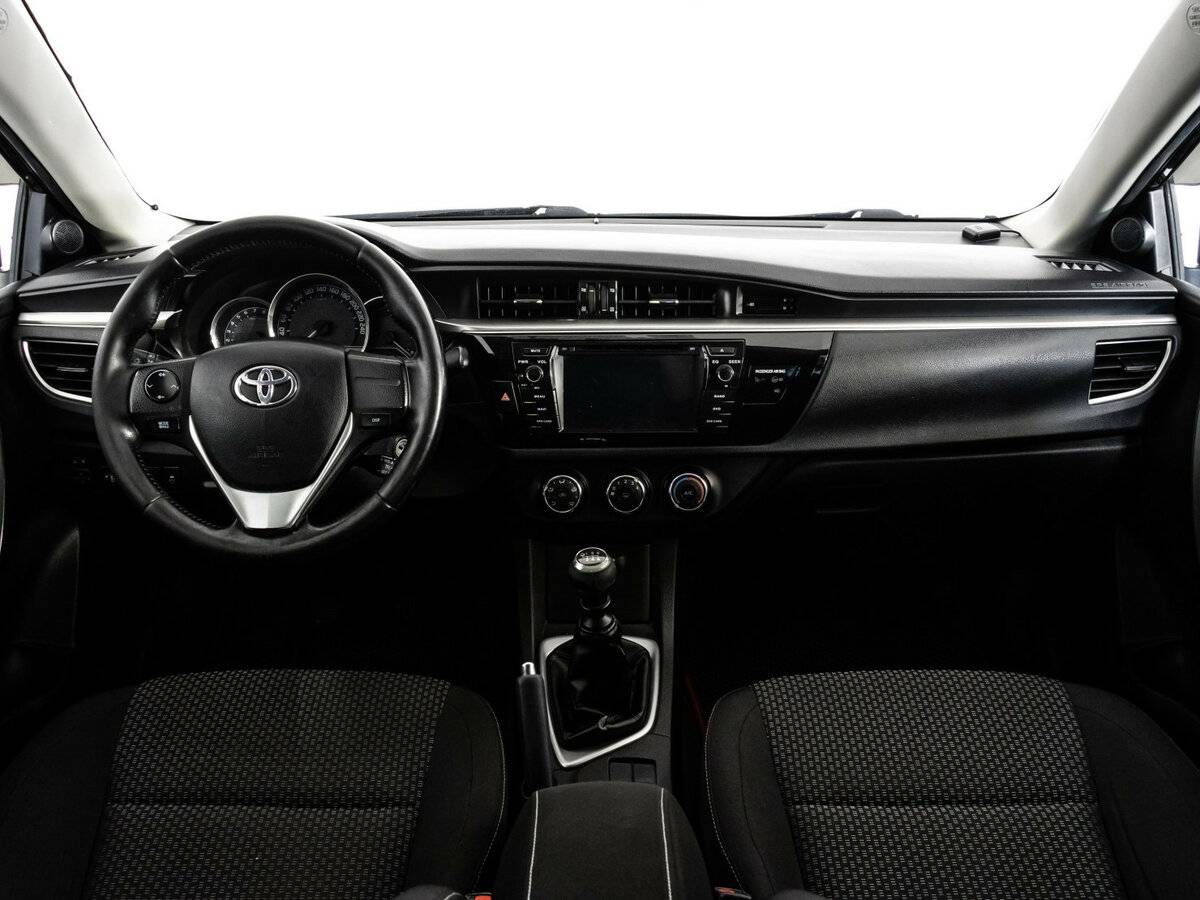 Б/У Тойота Королла 2013 года. Фото: #9