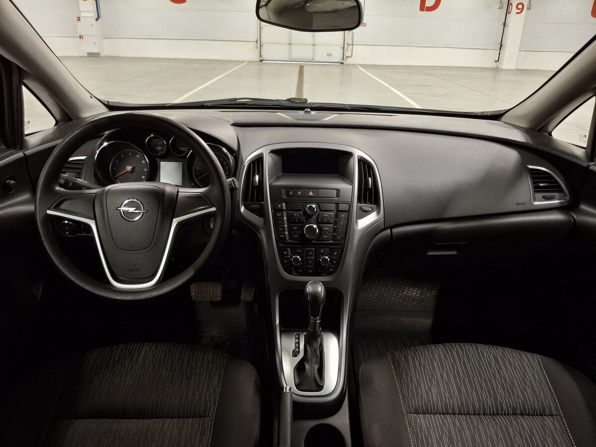 Б/У Опель Астра 2013 года. Фото: #13