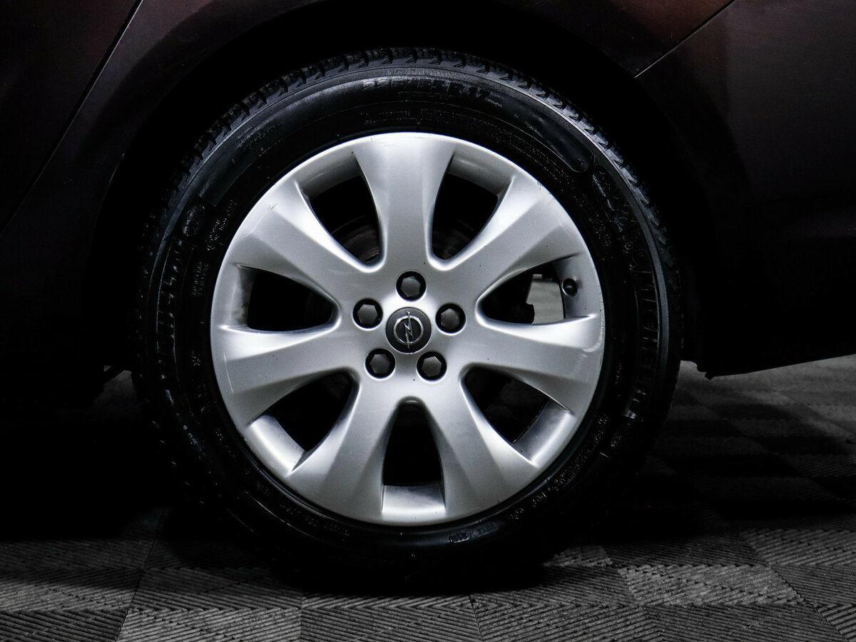 Б/У Опель Астра 2012 года. Фото: #11