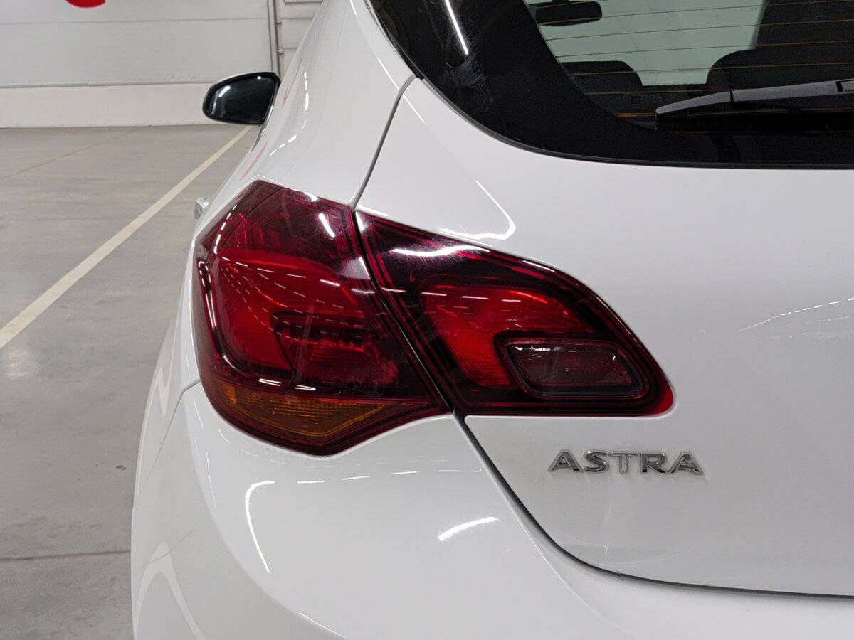 Б/У Опель Астра 2013 года. Фото: #8